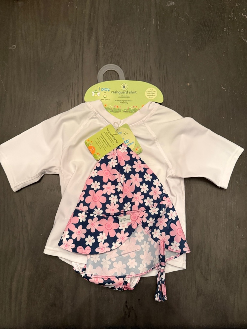 3T I play by green sprouts rashguard shirt, sun protection hat and swim diaper.